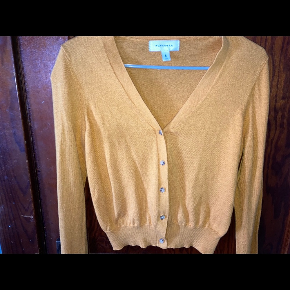 Yellow buttoned sweater